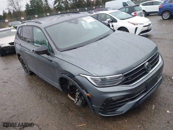 2023 Volkswagen Tiguan SE R-Line Black with VIN 3VVCB7AX0PM132194, listed as a IAAI auction lot 41594049 with 15,080 mi miles. Bid and sale history available at carsss.com. Image 1.
