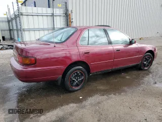 1996 Toyota Camry DX with VIN 4T1BG12KXTU739460, listed as a Copart auction lot 89107105 with 131,237 mi miles and Salvage Title. Bid and sale history available at carsss.com. Image 3.