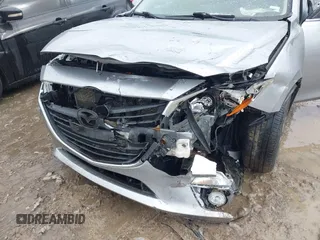 2015 Mazda 3 i Grand Touring with VIN JM1BM1W79F1256535, listed as a IAAI auction lot 41474347 with 128,573 mi miles and . Bid and sale history available at DreamBid. Image 6.