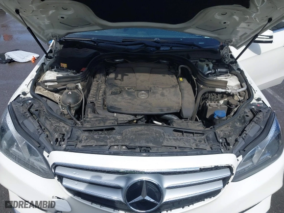 2014 Mercedes-Benz E-Class E 350 Luxury with VIN WDDHF8JB0EA850671, listed as a IAAI auction lot 41935999 with 139,386 mi miles. Bid and sale history available at carsss.com. Image 10.
