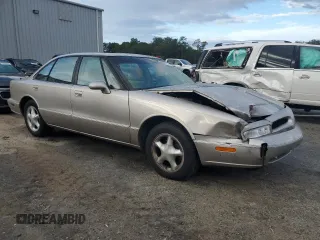 1997 Oldsmobile LSS z VIN 1G3HY52K9V4823565, wystawiony jako Copart lot #73965744 z przebiegiem 74 973 mil mil oraz Szkody całkowita. Historia ofert i sprzedaży dostępna na DreamBid. Obrazek 4.