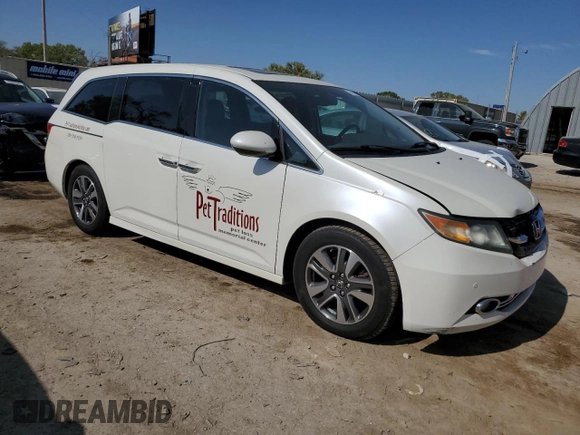 2014 Honda Odyssey Touring z VIN 5FNRL5H92EB059168, wystawiony jako Copart lot #76121914 z przebiegiem 264 715 mil mil oraz Szkoda całkowita • Salvage title. Historia ofert i sprzedaży dostępna na DreamBid. Obrazek 4.