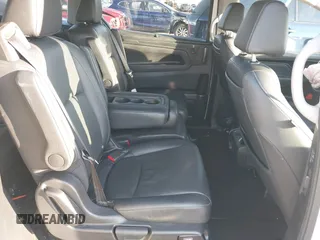 2022 Honda Odyssey Touring with VIN 5FNRL6H85NB058948, listed as a IAAI auction lot 42579157 with 53,669 mi miles and . Bid and sale history available at DreamBid. Image 8.