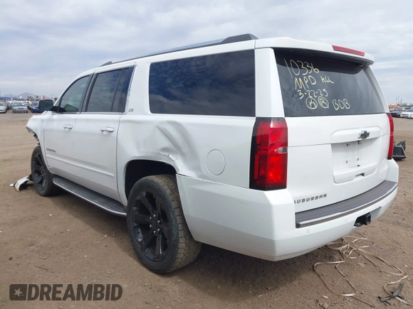 2015 Chevrolet Suburban LTZ with VIN 1GNSKKKC5FR691219, listed as a IAAI auction lot 41921973 with 169,119 mi miles and . Bid and sale history available at DreamBid. Image 14.