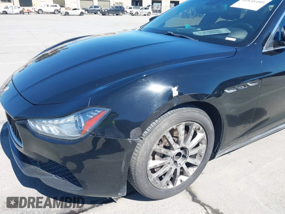 2014 Maserati Ghibli z VIN ZAM57XSA5E1091490, wystawiony jako IAAI lot #41848480 z przebiegiem 129 585 mil mil oraz . Historia ofert i sprzedaży dostępna na DreamBid. Obrazek 6.