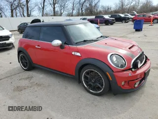 2011 MINI Hardtop S with VIN WMWSV3C54BTY14542, listed as a Copart auction lot 49490325 with 118,223 mi miles and Salvage Title. Bid and sale history available at DreamBid. Image 4.