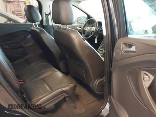 2014 Ford Escape SE with VIN 1FMCU9G95EUA16328, listed as a IAAI auction lot 42464235 with 108,570 mi miles and . Bid and sale history available at DreamBid. Image 8.