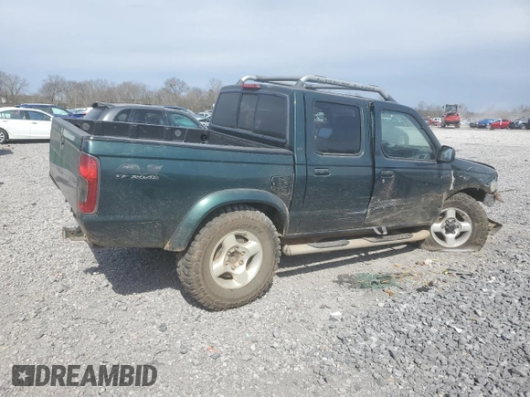 2000 Nissan Frontier XE with VIN 1N6ED27Y4YC382199, listed as a Copart auction lot 47127045 with 207,449 mi miles and Salvage title. Bid and sale history available at DreamBid. Image 3.