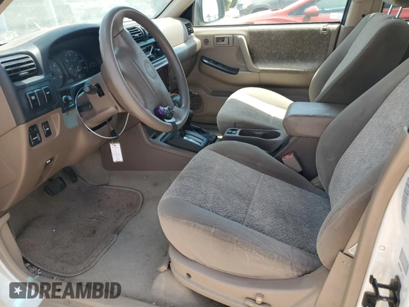 2001 Isuzu Rodeo S with VIN 4S2DM58W414330847, listed as a Copart auction lot 64028134 with 160,027 mi miles and Clean title. Bid and sale history available at DreamBid. Image 7.