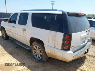 2011 GMC Yukon XL Denali with VIN 1GKS2MEF9BR198152, listed as a IAAI auction lot 41990816 with 235,010 mi miles. Bid and sale history available at carsss.com. Image 3.