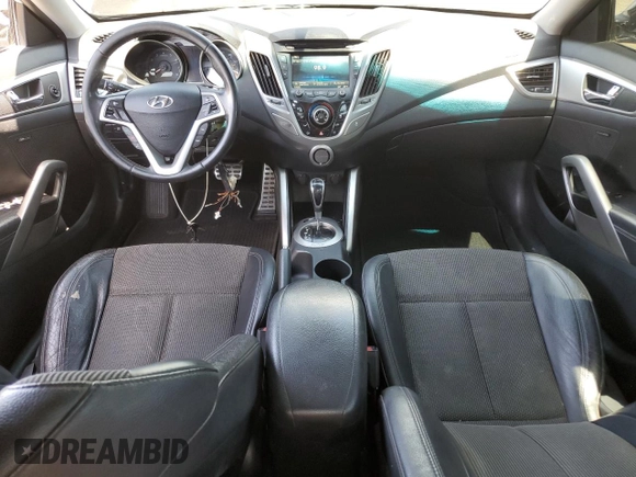 2013 Hyundai Veloster w/Gray Int z VIN KMHTC6AD9DU138719, wystawiony jako Copart lot #57494735 z przebiegiem 149 255 mil mil oraz Szkoda całkowita • Salvage title. Historia ofert i sprzedaży dostępna na DreamBid. Obrazek 8.