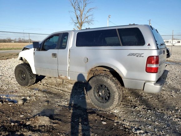 2005 Ford F-150 XL with VIN 1FTRF14WX5NA21751, listed as a Copart auction lot 80628494 with 236,866 mi miles and Salvage Title. Bid and sale history available at carsss.com. Image 2.