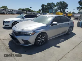 2023 Honda Civic EX z VIN 2HGFE1F79PH307857, wystawiony jako Copart lot #58602475 z przebiegiem 50 316 mil mil oraz Szkoda całkowita • Salvage title. Historia ofert i sprzedaży dostępna na DreamBid. Obrazek 1.