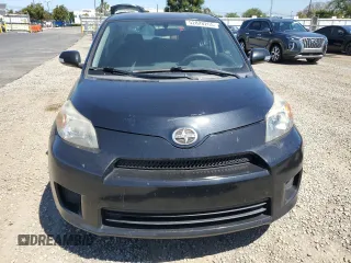 2010 Scion xD with VIN JTKKU4B49AJ058035, listed as a Copart auction lot 52828265 with 248,960 mi miles and Salvage Title. Bid and sale history available at carsss.com. Image 5.