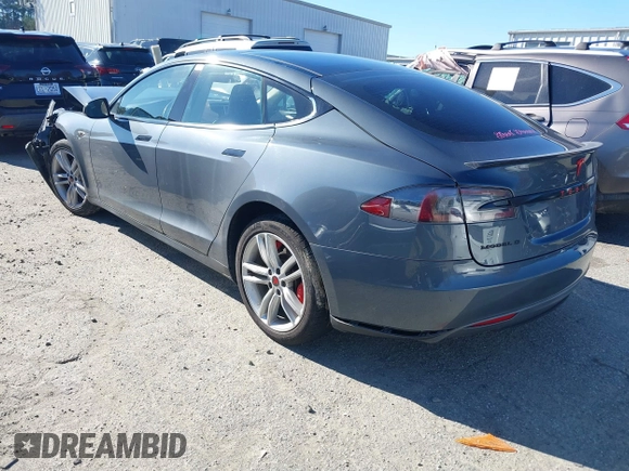 2013 Tesla Model S Performance with VIN 5YJSA1DP7DFP11737, listed as a IAAI auction lot 40915195 with Not provided miles and . Bid and sale history available at DreamBid. Image 3.