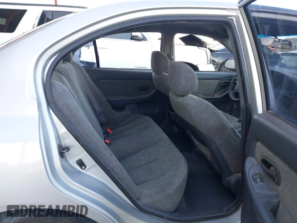 2003 Hyundai Elantra GLS z VIN KMHDN45D43U552485, wystawiony jako IAAI lot #41680449 z przebiegiem 127 899 mil mil oraz . Historia ofert i sprzedaży dostępna na DreamBid. Obrazek 8.