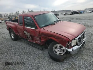 2000 Ford Ranger XL with VIN 1FTZR15V1YTB05504, listed as a Copart auction lot 47763485 with 211,756 mi miles and Salvage Title. Bid and sale history available at DreamBid. Image 4.