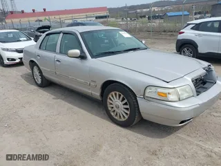 2010 Mercury Grand Marquis LS with VIN 2MEBM7FV6AX627666, listed as a IAAI auction lot 42030395 with 168,037 mi miles. Bid and sale history available at carsss.com. Image 1.