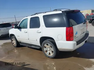 2011 GMC Yukon SLT with VIN 1GKS2CE03BR397395, listed as a IAAI auction lot 41813501 with 220,443 mi miles. Bid and sale history available at carsss.com. Image 14.