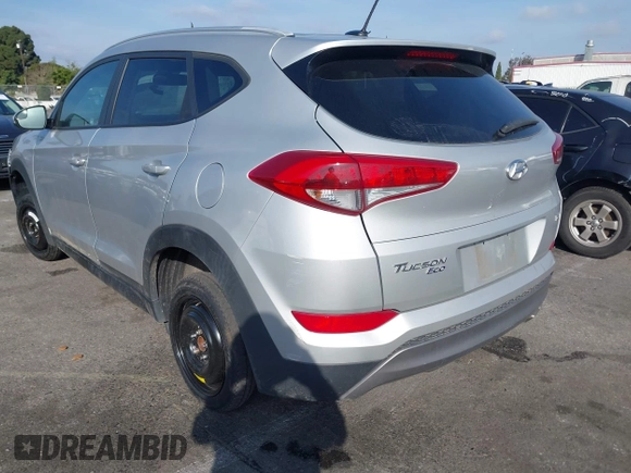 2016 Hyundai Tucson Sport with VIN KM8J33A20GU165154, listed as a IAAI auction lot 41611785 with Not Provided miles. Bid and sale history available at carsss.com. Image 3.