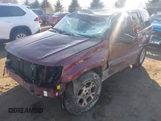 2000 Jeep Grand Cherokee Laredo with VIN 1J4GW48N3YC231743, listed as a IAAI auction lot 41316680 with Not provided miles and . Bid and sale history available at DreamBid. Image 17.