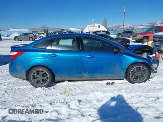 2014 Ford Focus SE with VIN 1FADP3F24EL421528, listed as a IAAI auction lot 41571243 with 90,553 mi miles and . Bid and sale history available at DreamBid. Image 14.