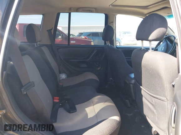 2004 Jeep Grand Cherokee Laredo z VIN 1J4GX48S04C281660, wystawiony jako IAAI lot #42551161 z przebiegiem 173 209 mil mil oraz . Historia ofert i sprzedaży dostępna na DreamBid. Obrazek 8.