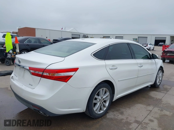2014 Toyota Avalon Limited z VIN 4T1BK1EB6EU098479, wystawiony jako IAAI lot #42171736 z przebiegiem 92 290 mil mil oraz . Historia ofert i sprzedaży dostępna na DreamBid. Obrazek 4.