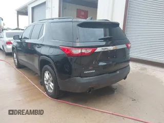 2020 Chevrolet Traverse LT Cloth with VIN 1GNERGKW5LJ305358, listed as a IAAI auction lot 42009990 with 104,496 mi miles. Bid and sale history available at carsss.com. Image 3.