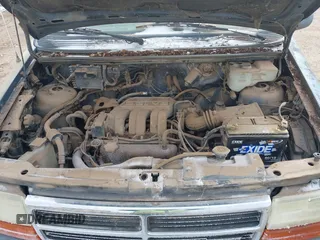 1991 Dodge Grand Caravan with VIN 1B4GK54R4MX558183, listed as a IAAI auction lot 41604086 with 210,400 mi miles and . Bid and sale history available at DreamBid. Image 10.