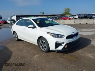2021 Kia Forte LXS with VIN 3KPF24ADXME286403, listed as a IAAI auction lot 41128569 with 80,748 mi miles. Bid and sale history available at carsss.com. Image 1.