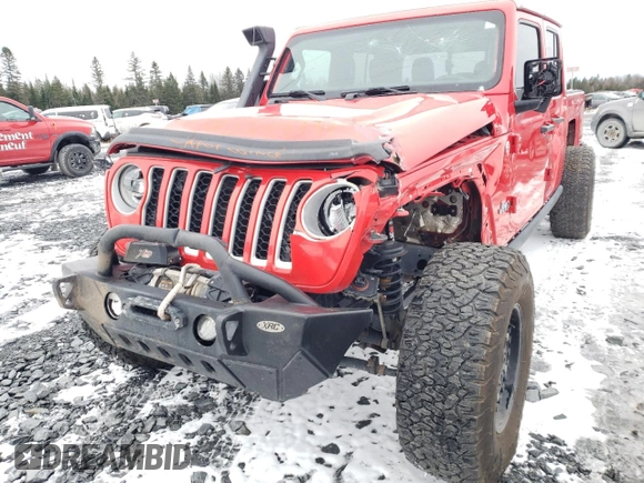 2020 Jeep Gladiator Overland with VIN 1C6HJTFG9LL152701, listed as a Copart auction lot 80737794 with 61,654 mi miles and Salvage title. Bid and sale history available at DreamBid. Image 12.