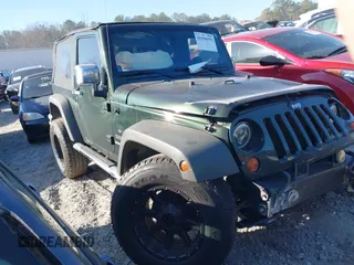 2010 Jeep Wrangler Sport with VIN 1J4AA2D16AL212492, listed as a IAAI auction lot 41656955 with 225,718 mi miles and . Bid and sale history available at carsss.com. Image 12.