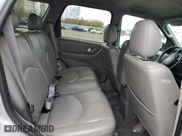 2002 Mazda Tribute LX with VIN 4F2CU08192KM41728, listed as a Copart auction lot 78221954 with 140,782 mi miles and Salvage Title. Bid and sale history available at carsss.com. Image 11.