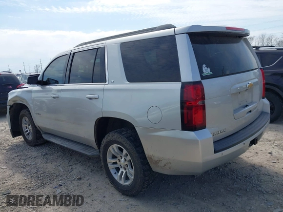 2015 Chevrolet Tahoe LT with VIN 1GNSCBKC4FR552034, listed as a IAAI auction lot 41891302 with 145,969 mi miles and . Bid and sale history available at DreamBid. Image 3.
