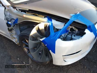 2023 Tesla Model 3 z VIN 5YJ3E1EAXPF584537, wystawiony jako IAAI lot #41464243 z przebiegiem 33 229 mil mil oraz . Historia ofert i sprzedaży dostępna na DreamBid. Obrazek 6.