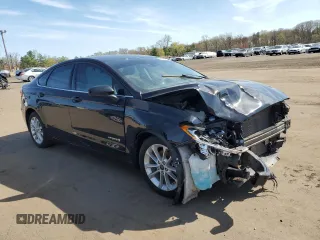 2019 Ford Fusion SE with VIN 3FA6P0LUXKR274464, listed as a Copart auction lot 54185115 with Not Provided miles and Salvage Title. Bid and sale history available at DreamBid. Image 4.