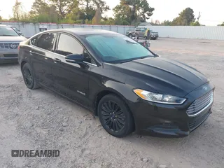 2015 Ford Fusion SE Hybrid with VIN 3FA6P0LU8FR310626, listed as a IAAI auction lot 40048581 with 124,086 mi miles and . Bid and sale history available at DreamBid. Image 1.