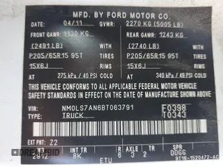 2011 Ford Transit Connect XL with VIN NM0LS7AN6BT063791, listed as a Copart auction lot 54600735 with 192,491 mi miles and Salvage title. Bid and sale history available at DreamBid. Image 13.