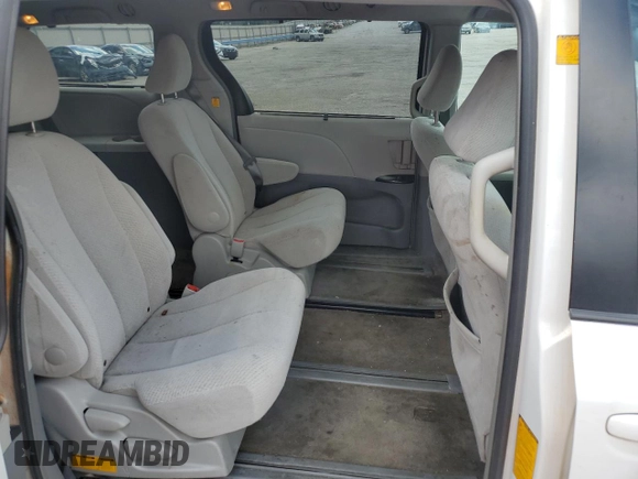 2012 Toyota Sienna LE with VIN 5TDJK3DC0CS043968, listed as a Copart auction lot 72185614 with 166,194 mi miles and Salvage Title. Bid and sale history available at carsss.com. Image 11.