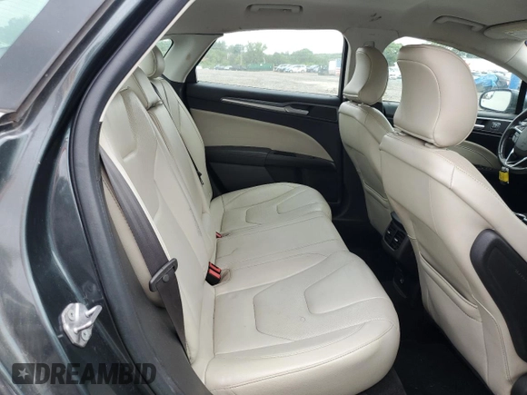 2016 Ford Fusion Titanium with VIN 3FA6P0K95GR158075, listed as a Copart auction lot 64476715 with 137,656 mi miles and Salvage title. Bid and sale history available at DreamBid. Image 10.
