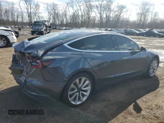 2019 Tesla Model 3 Mid Range with VIN 5YJ3E1EA6KF312754, listed as a Copart auction lot 50403855 with 148,217 mi miles and Salvage Title. Bid and sale history available at carsss.com. Image 3.