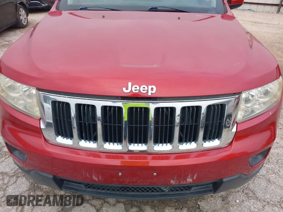 2011 Jeep Grand Cherokee Laredo with VIN 1J4RS4GG1BC673290, listed as a IAAI auction lot 42042557 with 147,590 mi miles and . Bid and sale history available at DreamBid. Image 6.