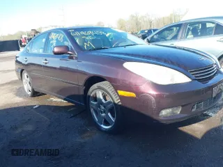2002 Lexus ES 300 with VIN JTHBF30G525015040, listed as a IAAI auction lot 41969408 with 175,587 mi miles. Bid and sale history available at carsss.com. Image 1.