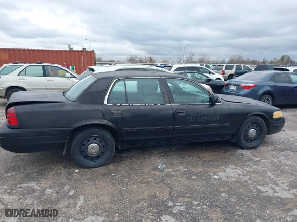 2011 Ford Crown Victoria with VIN 2FABP7AV4BX166216, listed as a IAAI auction lot 41268754 with 205,308 mi miles. Bid and sale history available at carsss.com. Image 13.