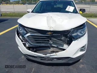 2020 Chevrolet Equinox LT z VIN 3GNAXKEV0LS650936, wystawiony jako IAAI lot #42263480 z przebiegiem 51 723 mil mil oraz . Historia ofert i sprzedaży dostępna na DreamBid. Obrazek 6.