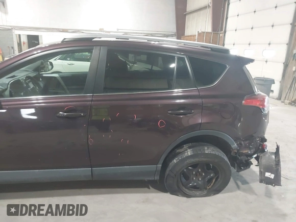 2018 Toyota RAV4 LE with VIN 2T3BFREV0JW759714, listed as a IAAI auction lot 41823084 with 119,909 mi miles and . Bid and sale history available at DreamBid. Image 18.