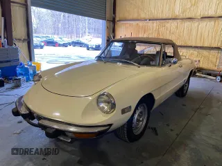 1973 Alfa Romeo Spider z VIN AR3041681, wystawiony jako Copart lot #55390735 z przebiegiem 20 513 mil mil oraz Tytuł czysty. Historia ofert i sprzedaży dostępna na DreamBid. Obrazek 2.