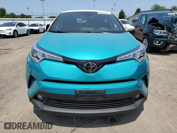 2018 Toyota C-HR XLE z VIN JTNKHMBX2J1005811, wystawiony jako Copart lot #59162315 z przebiegiem 35 191 mil mil oraz Szkoda całkowita • Salvage title. Historia ofert i sprzedaży dostępna na DreamBid. Obrazek 5.