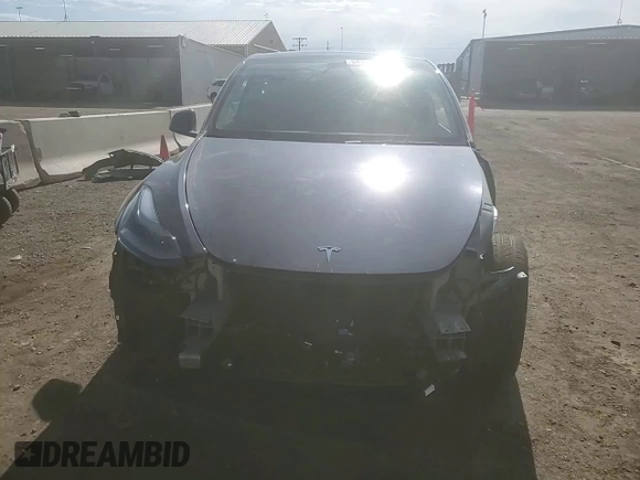 2023 Tesla Model Y Long Range z VIN 7SAYGDEE7PF965446, wystawiony jako Copart lot #54710375 z przebiegiem 23 807 mil mil oraz Szkoda całkowita • Salvage title. Historia ofert i sprzedaży dostępna na DreamBid. Obrazek 15.